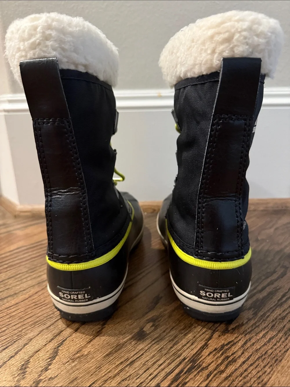 Sorel Kids Yoot Blk nylon boots with Neon Yellow Accents and Cream Faux Fur